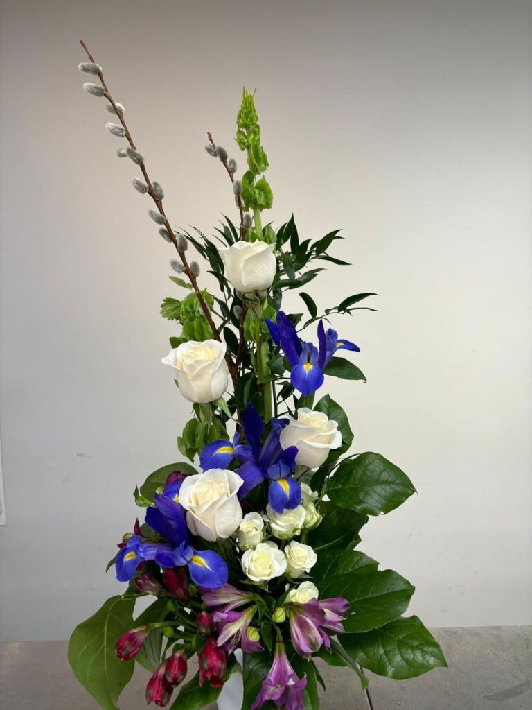 Ivory roses and blue iris with pussy willow